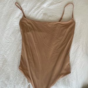 tan SKIMS bodysuit